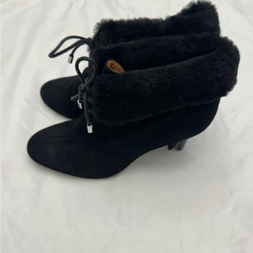 Women fur lined Coach heels size 9.5B